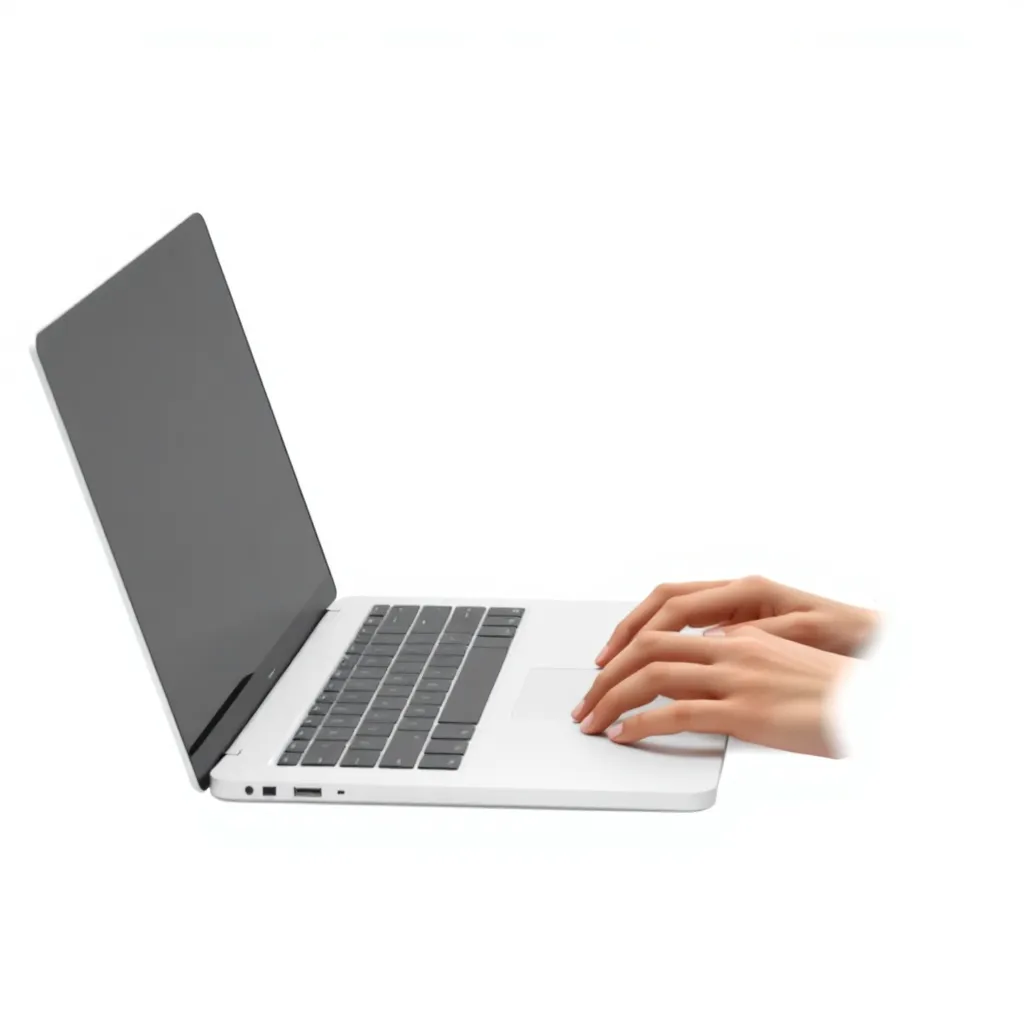 A person typing on a laptop